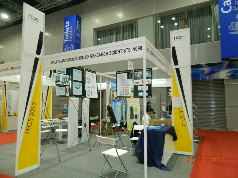 Booth #90 under the banner of the Booth #90 under the banner of the
